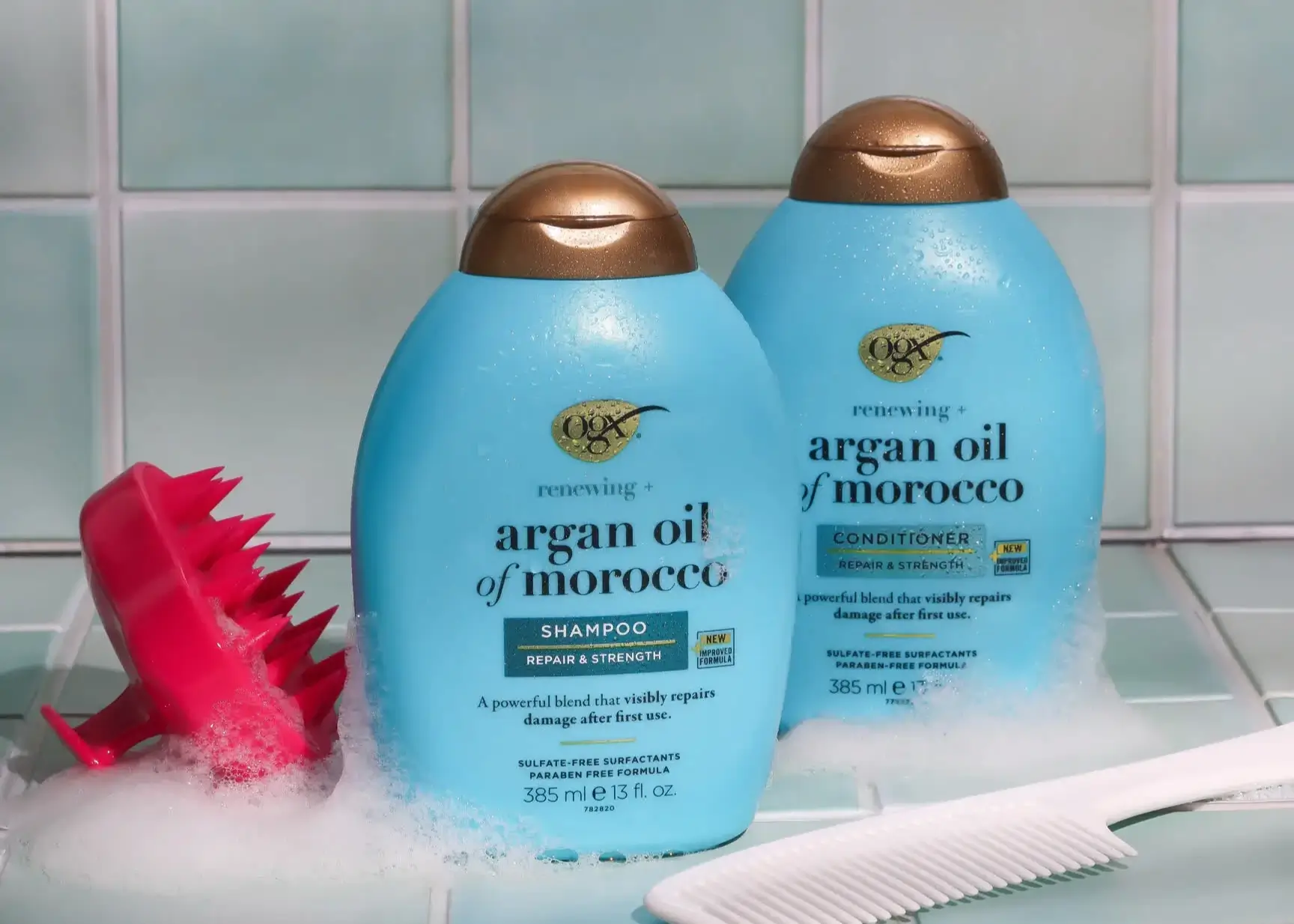 Image displaying OGX Argan Oil of Morrocco Shampoo and Conditioner 13 oz in the bathroom